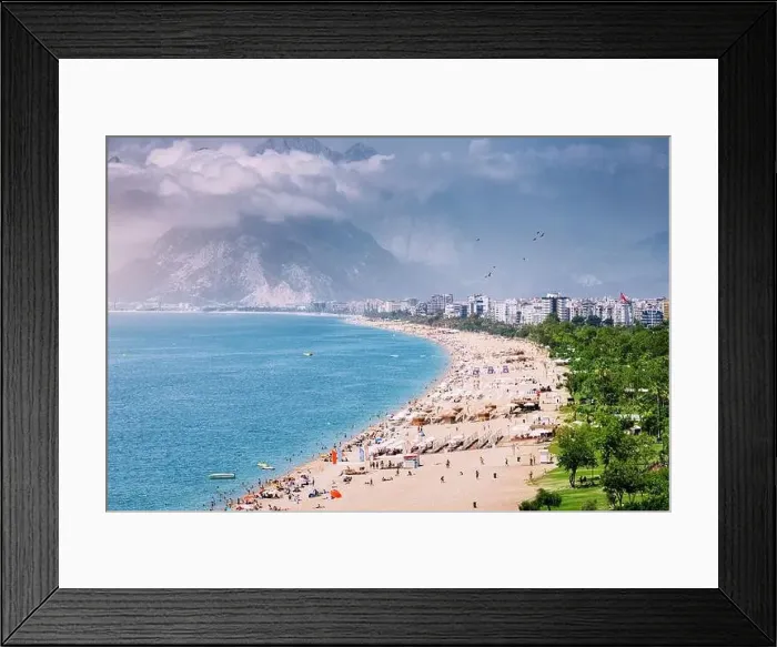 Framed Print : Crowded Antalya city Konyaalti beach with hundreds of vacationers and tourists resting Framed Print : Crowded Antalya city Konyaalti beach with hundreds of vacationers and tourists resting