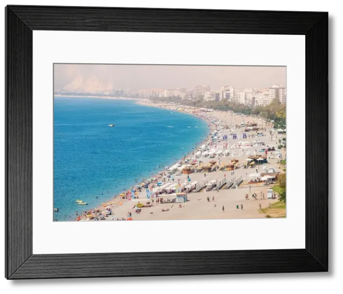 Framed Print : 04 June 2022, Antalya, Turkey: Crowded city beach with hundreds of vacationers and tourists resting Framed Print : 04 June 2022, Antalya, Turkey: Crowded city beach with hundreds of vacationers and tourists resting