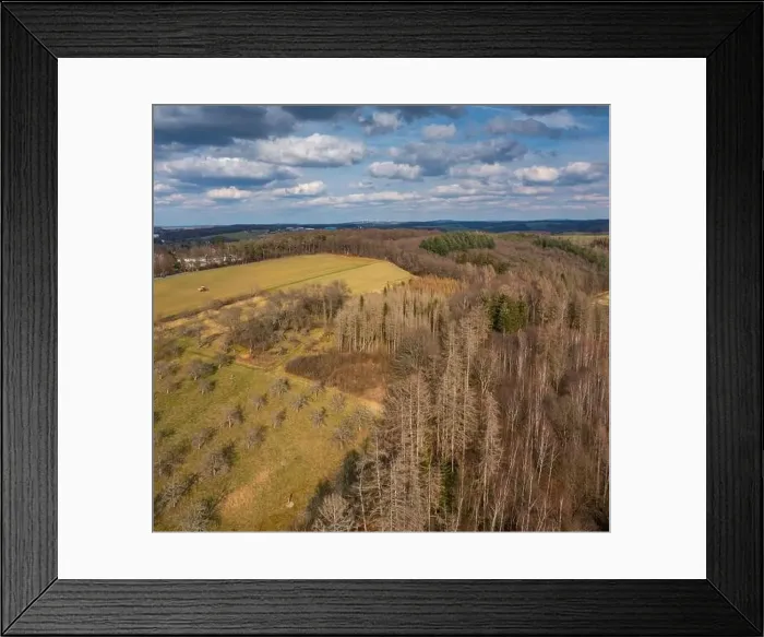 Framed Print : Aerial view over forests and meadows of Westerwald, Altenkirchen, Germany Framed Print : Aerial view over forests and meadows of Westerwald, Altenkirchen, Germany