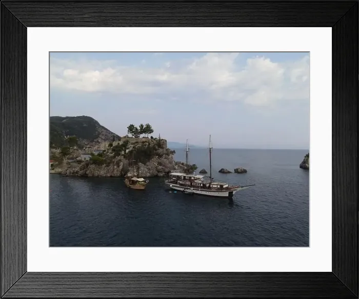 Framed Print : Aerial View Pirate Ships Near Island Of Panagia In Famous Tourist Destination Parga Town The Greek Caribbean Of Epirus Framed Print : Aerial View Pirate Ships Near Island Of Panagia In Famous Tourist Destination Parga Town The Greek Caribbean Of Epirus