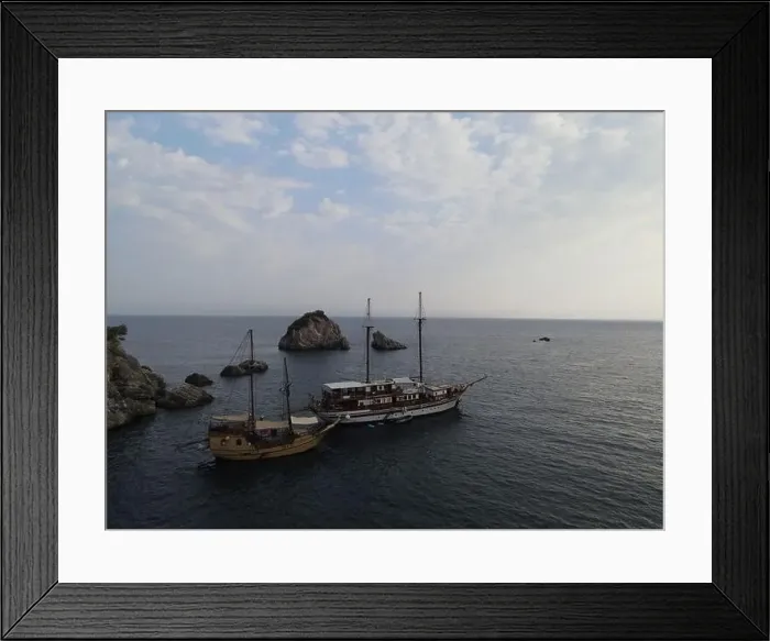Framed Print : Aerial View Pirate Ships Near Island Of Panagia In Famous Tourist Destination Parga Town The Greek Caribbean Of Epirus Framed Print : Aerial View Pirate Ships Near Island Of Panagia In Famous Tourist Destination Parga Town The Greek Caribbean Of Epirus