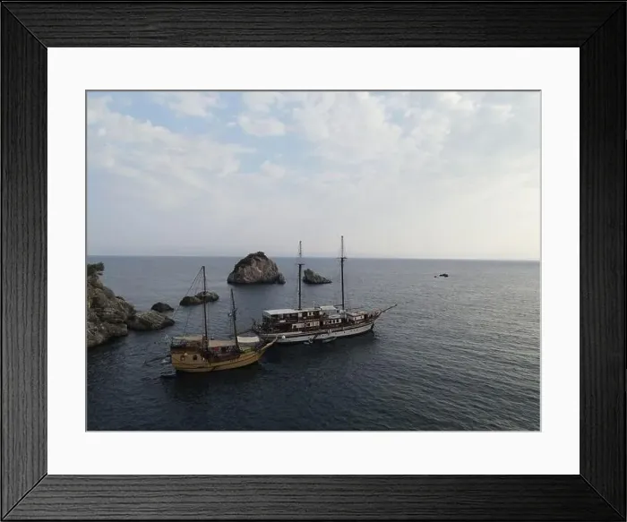 Framed Print : Aerial View Pirate Ships Near Island Of Panagia In Famous Tourist Destination Parga Town The Greek Caribbean Of Epirus Framed Print : Aerial View Pirate Ships Near Island Of Panagia In Famous Tourist Destination Parga Town The Greek Caribbean Of Epirus