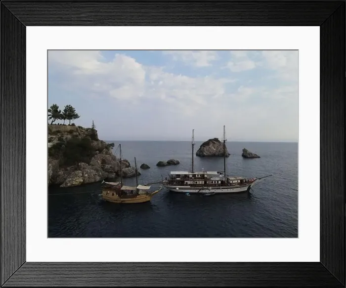 Framed Print : Aerial View Pirate Ships Near Island Of Panagia In Famous Tourist Destination Parga Town The Greek Caribbean Of Epirus Framed Print : Aerial View Pirate Ships Near Island Of Panagia In Famous Tourist Destination Parga Town The Greek Caribbean Of Epirus