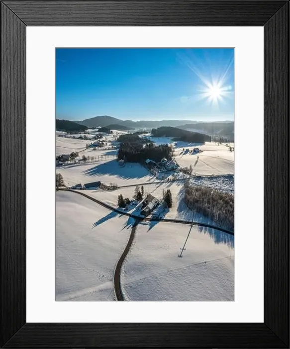 Framed Print : Snow-covered landscape at Christmas time in Hinterzarten in the Upper Black Forest, Germany Framed Print : Snow-covered landscape at Christmas time in Hinterzarten in the Upper Black Forest, Germany