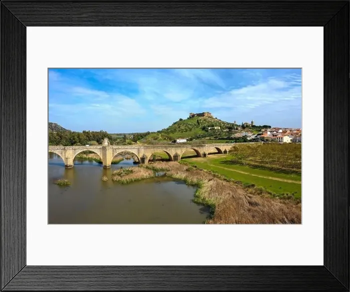 Framed Print : Aerial view of the Guadiana River and the town of Medellin with old bridge and castle Framed Print : Aerial view of the Guadiana River and the town of Medellin with old bridge and castle