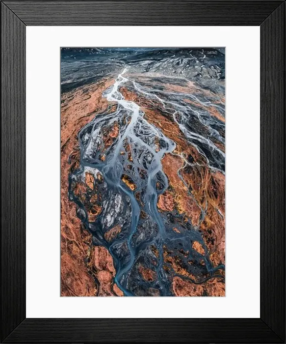 Framed Print : Top view of abstract glacier rivers pattern flowing through volcanic lava field in Icelandic highlands on summer Framed Print : Top view of abstract glacier rivers pattern flowing through volcanic lava field in Icelandic highlands on summer