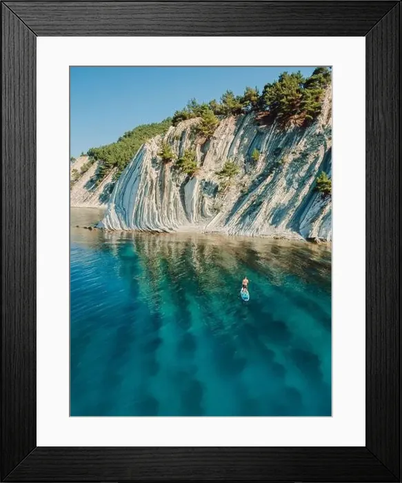 Framed Print : Man on stand up paddle board in blue sea Framed Print : Man on stand up paddle board in blue sea