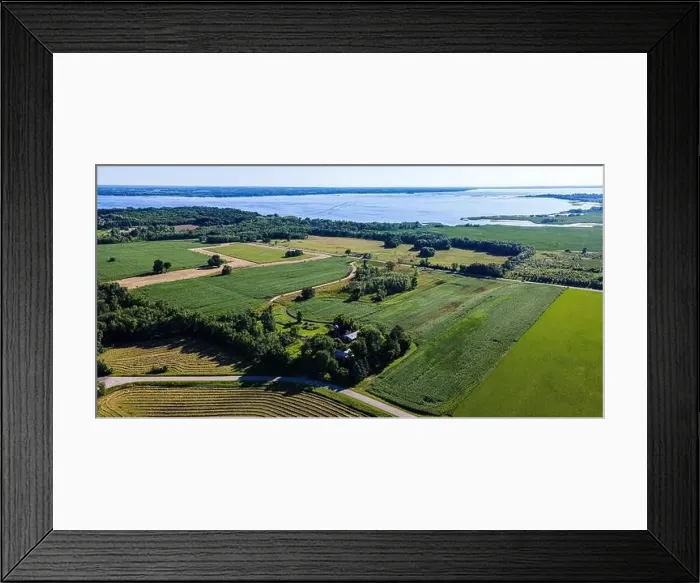 Framed Print : In rural wisconsin on a summer day - a view of Lake Winneconnie and rural famrs
