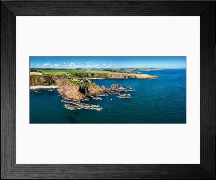 Framed Print : Panorama drone view of Dunnottar Castle and the wild coast of Aberdeenshire Framed Print : Panorama drone view of Dunnottar Castle and the wild coast of Aberdeenshire