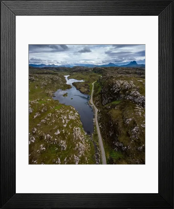 Framed Print : Coastal road on the North Coast 500 scenic drive in the Scottish Higlands near Lochniver Framed Print : Coastal road on the North Coast 500 scenic drive in the Scottish Higlands near Lochniver