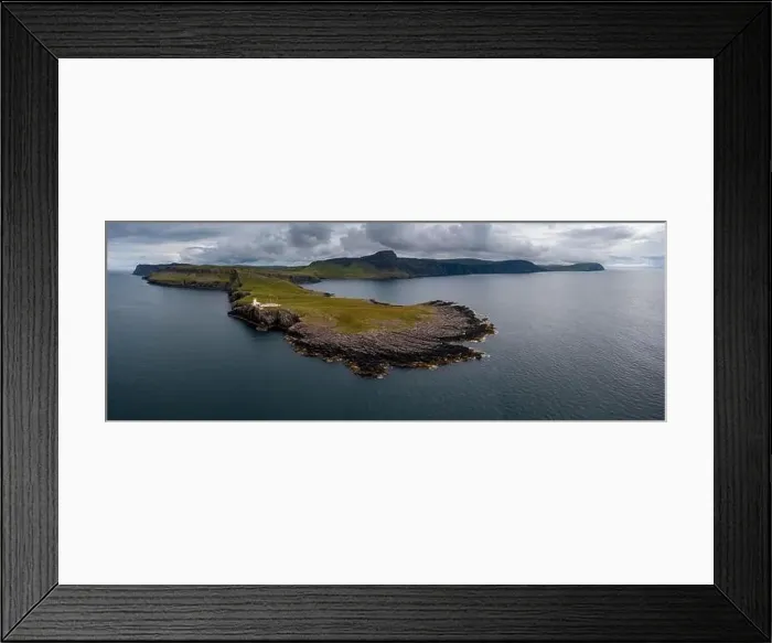 Framed Print : A panorama landscape view of the Neist Point Lighthouse and the Minch on the western coast of Isle of Skye