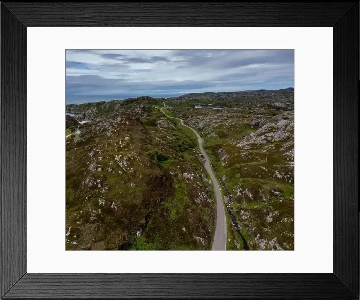 Framed Print : drone view of a coastal road and landscape on the North Coast 500 scenic drive in the Scottish Higlands near Lochniver Framed Print : drone view of a coastal road and landscape on the North Coast 500 scenic drive in the Scottish Higlands near Lochniver
