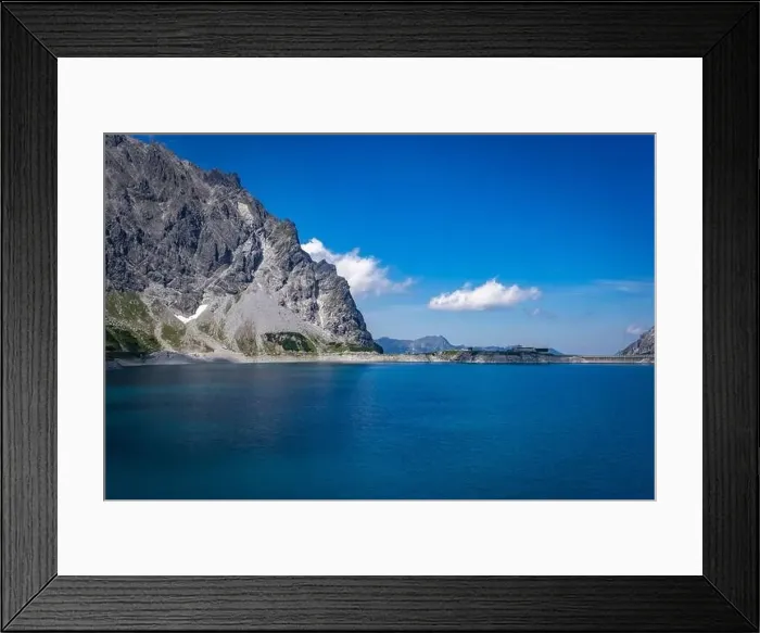 Framed Print : Wonderful landscape at the Luenersee with dam wall and rocks in Vorarlberg, Austria Framed Print : Wonderful landscape at the Luenersee with dam wall and rocks in Vorarlberg, Austria