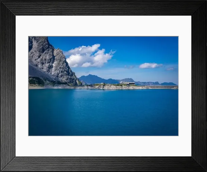 Framed Print : Wonderful landscape at the Luenersee with dam wall and rocks in Vorarlberg, Austria Framed Print : Wonderful landscape at the Luenersee with dam wall and rocks in Vorarlberg, Austria