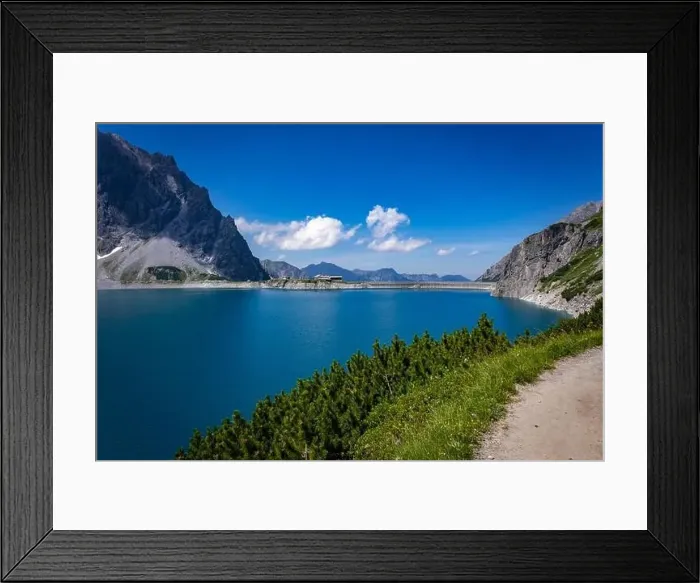 Framed Print : Wonderful landscape at the Luenersee with dam wall and rocks in Vorarlberg, Austria Framed Print : Wonderful landscape at the Luenersee with dam wall and rocks in Vorarlberg, Austria