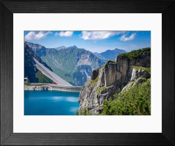 Framed Print : Wonderful landscape at the Luenersee with dam wall and rocks in Vorarlberg, Austria Framed Print : Wonderful landscape at the Luenersee with dam wall and rocks in Vorarlberg, Austria