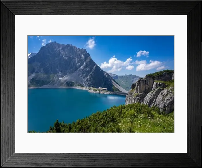 Framed Print : Wonderful landscape at the Luenersee with dam wall and rocks in Vorarlberg, Austria Framed Print : Wonderful landscape at the Luenersee with dam wall and rocks in Vorarlberg, Austria