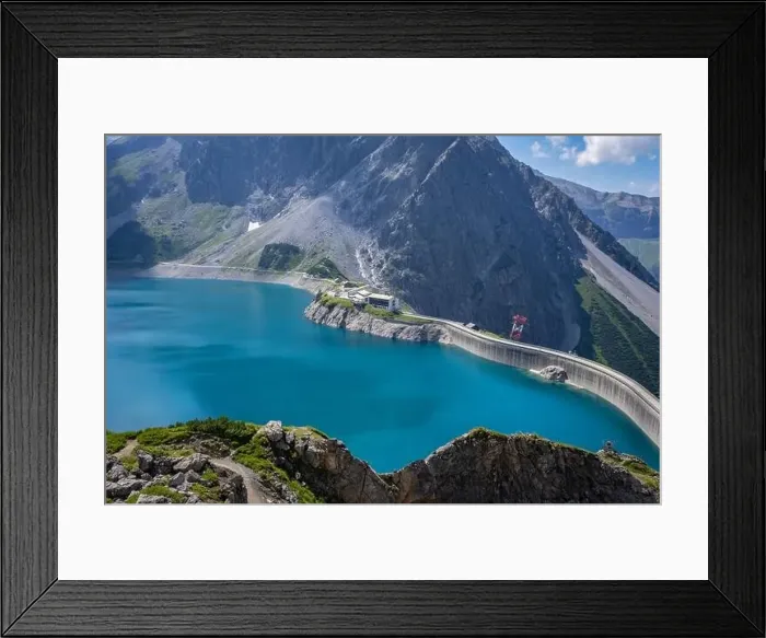 Framed Print : Wonderful landscape at the Luenersee with dam wall and rocks in Vorarlberg, Austria Framed Print : Wonderful landscape at the Luenersee with dam wall and rocks in Vorarlberg, Austria