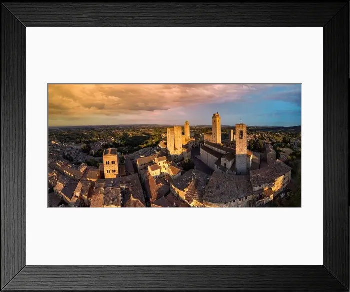 Framed Print : San Gimignano - one of the most beautiful medieval towns in Tuscany, Italy. aerial view of towers over sunset Framed Print : San Gimignano - one of the most beautiful medieval towns in Tuscany, Italy. aerial view of towers over sunset