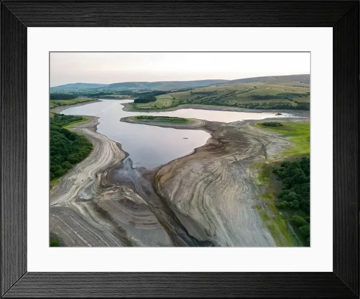 Framed Print : Drought conditions are shown through drone shots of Stocks Reservoir Hodder valley in the Forest of Bowland Framed Print : Drought conditions are shown through drone shots of Stocks Reservoir Hodder valley in the Forest of Bowland