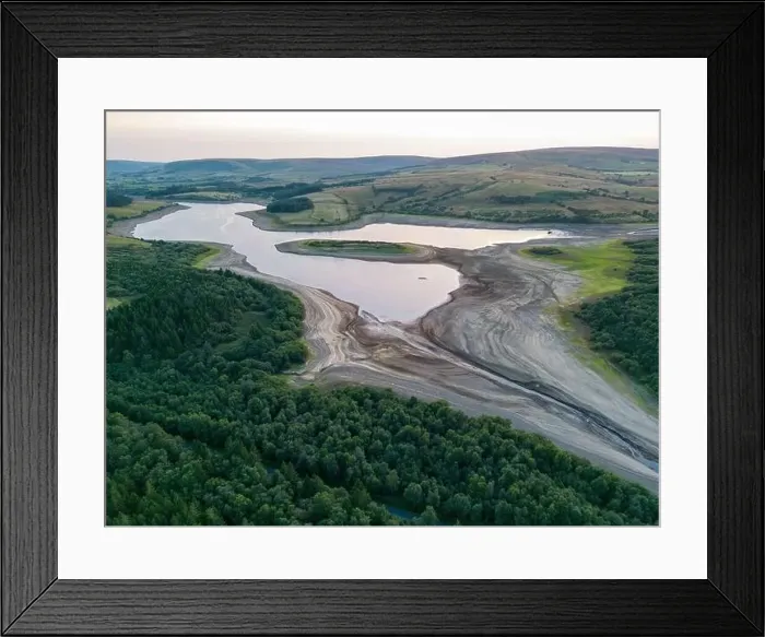 Framed Print : Drought conditions are shown through drone shots of Stocks Reservoir Hodder valley in the Forest of Bowland Framed Print : Drought conditions are shown through drone shots of Stocks Reservoir Hodder valley in the Forest of Bowland
