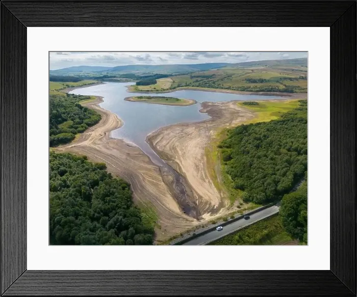 Framed Print : Drought conditions are shown through drone shots of Stocks Reservoir Hodder valley in the Forest of Bowland Framed Print : Drought conditions are shown through drone shots of Stocks Reservoir Hodder valley in the Forest of Bowland