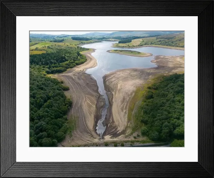 Framed Print : Drought conditions are shown through drone shots of Stocks Reservoir Hodder valley in the Forest of Bowland Framed Print : Drought conditions are shown through drone shots of Stocks Reservoir Hodder valley in the Forest of Bowland