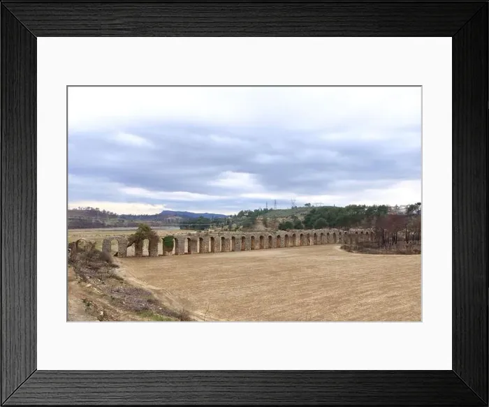 Framed Print : a view of viaduct arch bridge near small village in turkey Framed Print : a view of viaduct arch bridge near small village in turkey