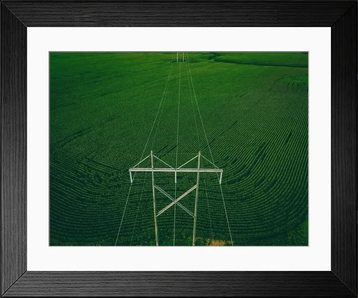 Framed Print : A grouping of powerlines over farm land in rural wisconsin