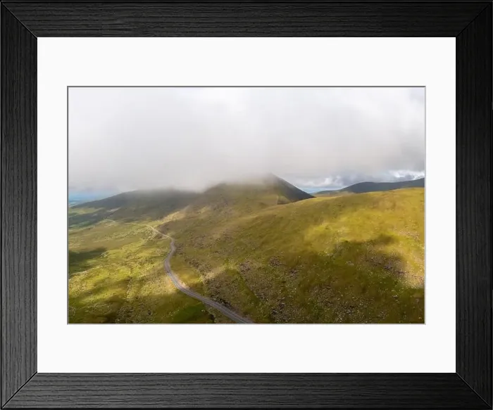 Framed Print : the steep and winding mountain road leading to the top of Connor Pass on the Dingle Peninsula Framed Print : the steep and winding mountain road leading to the top of Connor Pass on the Dingle Peninsula