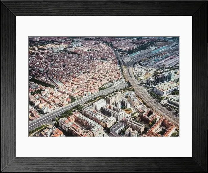 Framed Print : From above aerial drone view shot of city with dense infrastructure in Madrid, Spain Framed Print : From above aerial drone view shot of city with dense infrastructure in Madrid, Spain