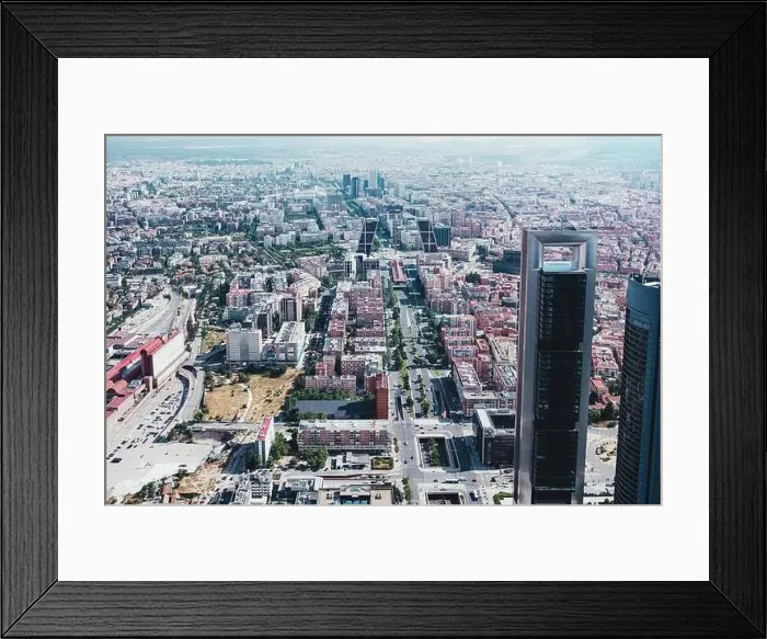 Framed Print : From above aerial drone view shot of city with dense infrastructure in Madrid, Spain Framed Print : From above aerial drone view shot of city with dense infrastructure in Madrid, Spain