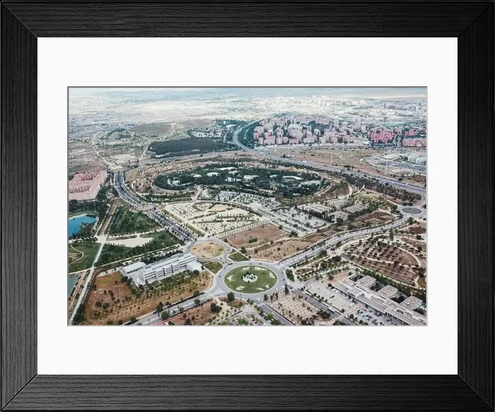 Framed Print : From above aerial drone view shot of city with dense infrastructure in Madrid, Spain Framed Print : From above aerial drone view shot of city with dense infrastructure in Madrid, Spain