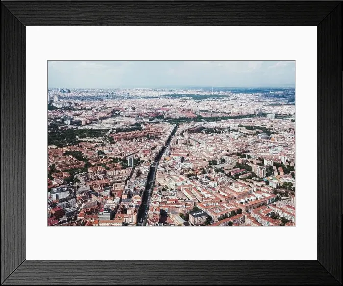 Framed Print : From above aerial drone view shot of city with dense infrastructure in Madrid, Spain Framed Print : From above aerial drone view shot of city with dense infrastructure in Madrid, Spain