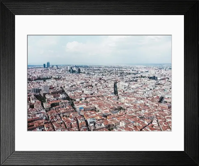 Framed Print : From above aerial drone view shot of city with dense infrastructure in Madrid, Spain Framed Print : From above aerial drone view shot of city with dense infrastructure in Madrid, Spain