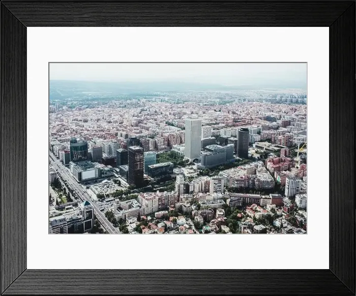 Framed Print : From above aerial drone view shot of city with dense infrastructure in Madrid, Spain Framed Print : From above aerial drone view shot of city with dense infrastructure in Madrid, Spain