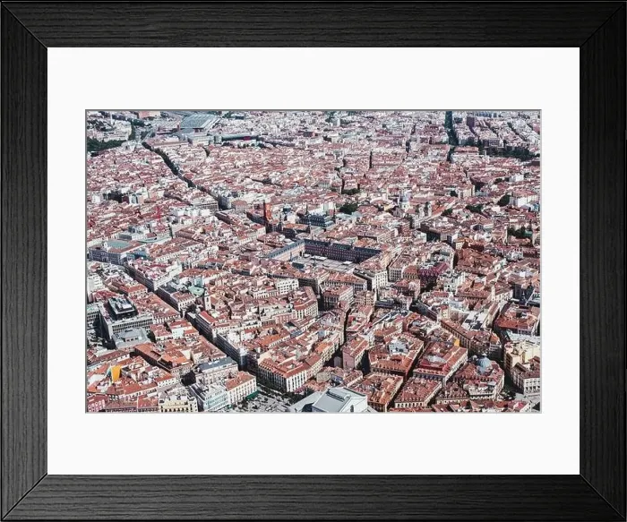 Framed Print : From above aerial drone view shot of city with dense infrastructure in Madrid, Spain Framed Print : From above aerial drone view shot of city with dense infrastructure in Madrid, Spain