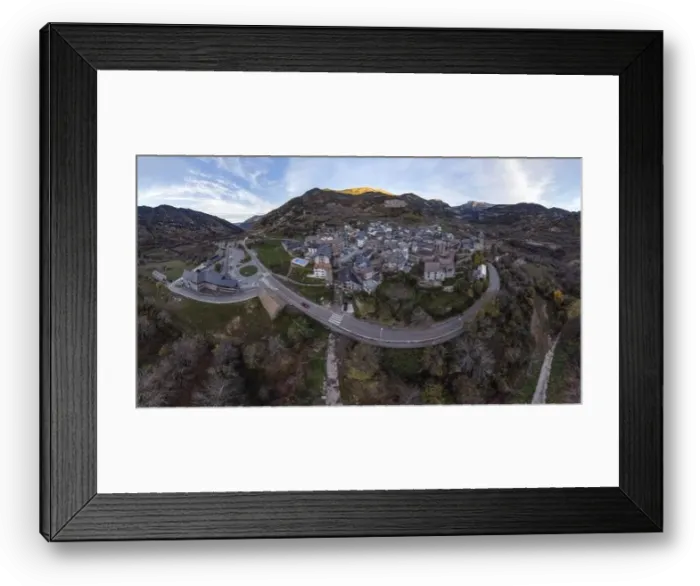 Framed Print : Spectacular drone view of small settlement located on top of rocky mountain near asphalt road in Huesca province of Framed Print : Spectacular drone view of small settlement located on top of rocky mountain near asphalt road in Huesca province of