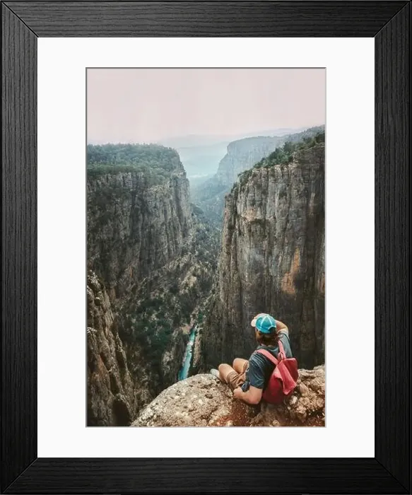 Framed Print : Man traveler sitting alone on cliff edge hiking with backpack travel healthy lifestyle active vacations outdoor hiker Framed Print : Man traveler sitting alone on cliff edge hiking with backpack travel healthy lifestyle active vacations outdoor hiker