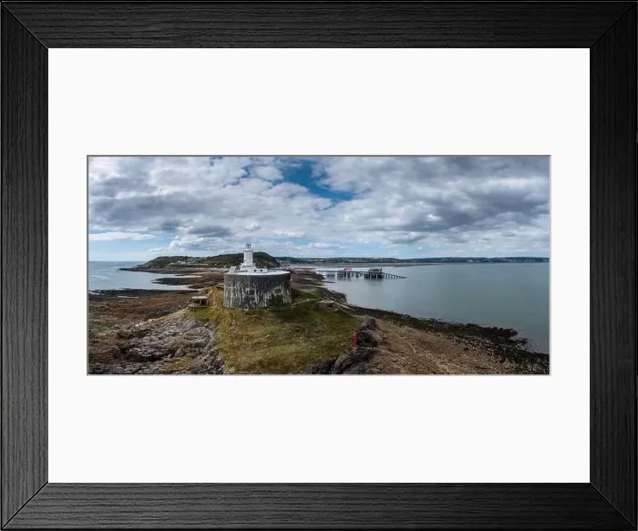 Framed Print : aerial view of the Mumbles headland with the historic lighthouse and piers in Swansea Bay Framed Print : aerial view of the Mumbles headland with the historic lighthouse and piers in Swansea Bay