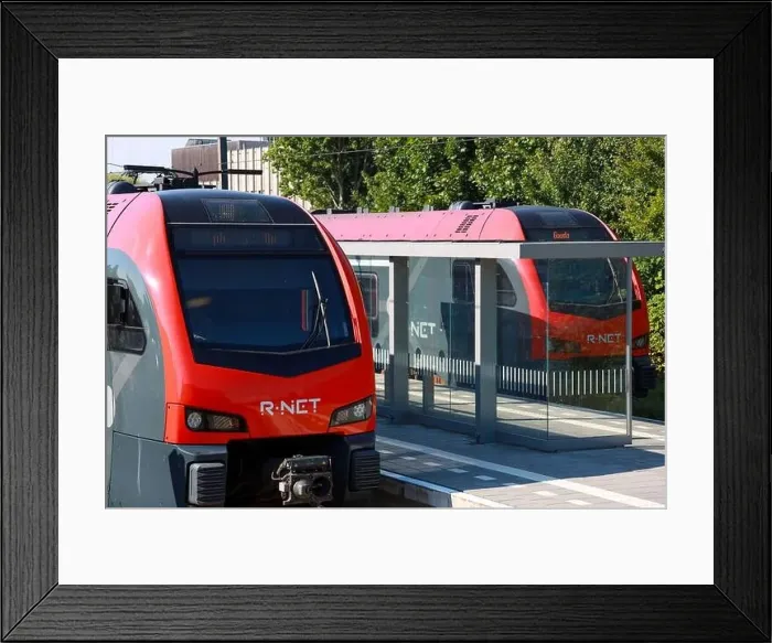 Framed Print : Two R-NET commuter trains are waiting on station of Boskoop between Gouda and Alphen aan den Rijn in the Netherlands Framed Print : Two R-NET commuter trains are waiting on station of Boskoop between Gouda and Alphen aan den Rijn in the Netherlands