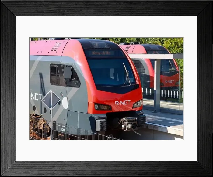 Framed Print : Two R-NET commuter trains are waiting on station of Boskoop between Gouda and Alphen aan den Rijn in the Netherlands Framed Print : Two R-NET commuter trains are waiting on station of Boskoop between Gouda and Alphen aan den Rijn in the Netherlands