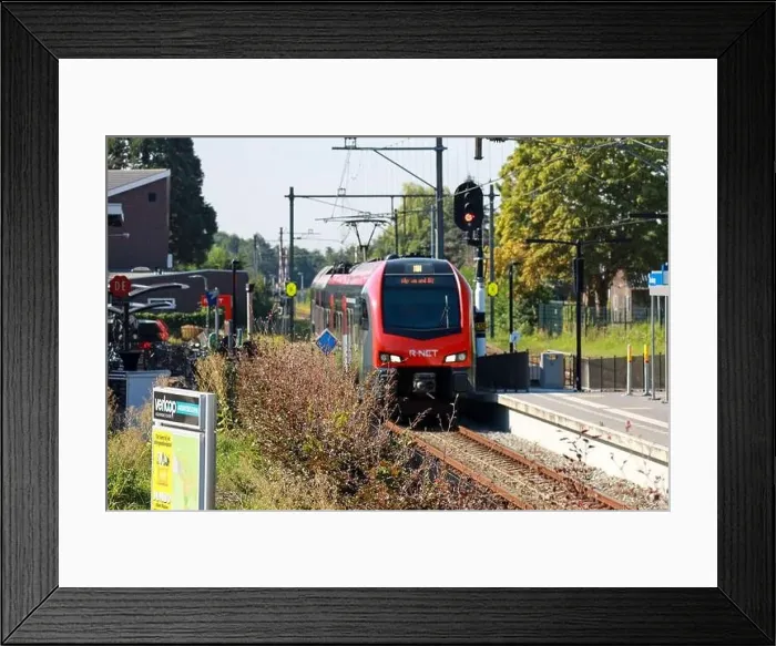 Framed Print : Two R-NET commuter trains are waiting on station of Boskoop between Gouda and Alphen aan den Rijn in the Netherlands Framed Print : Two R-NET commuter trains are waiting on station of Boskoop between Gouda and Alphen aan den Rijn in the Netherlands