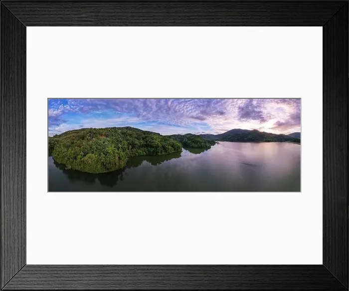 Framed Print : Aerial view drone shot of panorama abundant rainforest Sunset or sunrise sky over lake Framed Print : Aerial view drone shot of panorama abundant rainforest Sunset or sunrise sky over lake