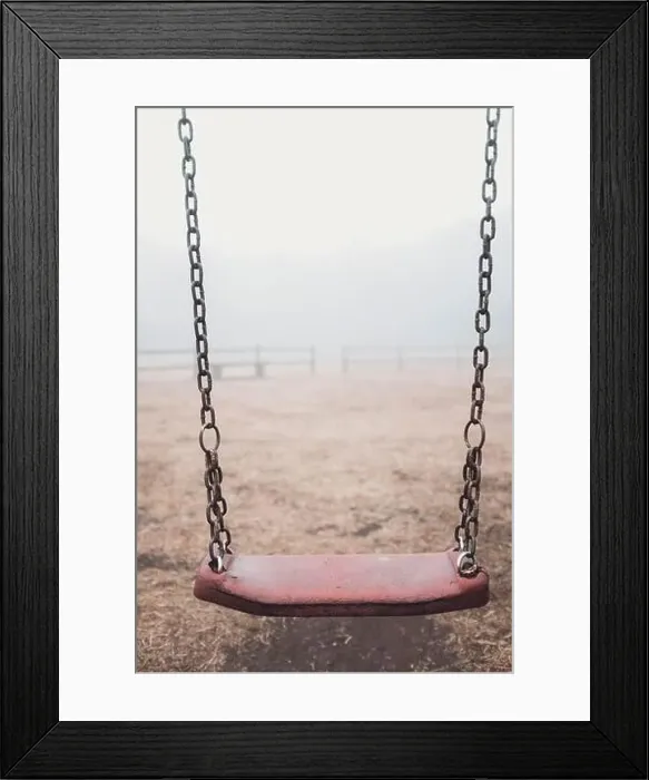 Framed Print : Ukrainian people against war. Scary empty swing at the park with fog in backgroind Framed Print : Ukrainian people against war. Scary empty swing at the park with fog in backgroind