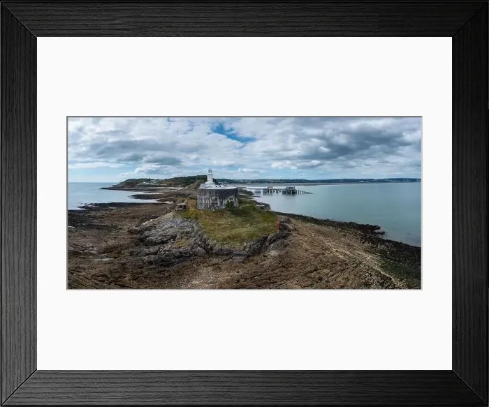 Framed Print : aerial view of the Mumbles headland with the historic lighthouse and piers in Swansea Bay Framed Print : aerial view of the Mumbles headland with the historic lighthouse and piers in Swansea Bay