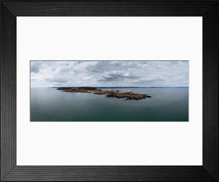 Framed Print : aerial view of the Mumbles headland with the historic lighthouse and piers in Swansea Bay Framed Print : aerial view of the Mumbles headland with the historic lighthouse and piers in Swansea Bay