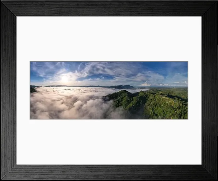 Framed Print : Aerial view of flowing fog waves on mountain tropical rainforest beautiful sunrise or sunset sky Framed Print : Aerial view of flowing fog waves on mountain tropical rainforest beautiful sunrise or sunset sky