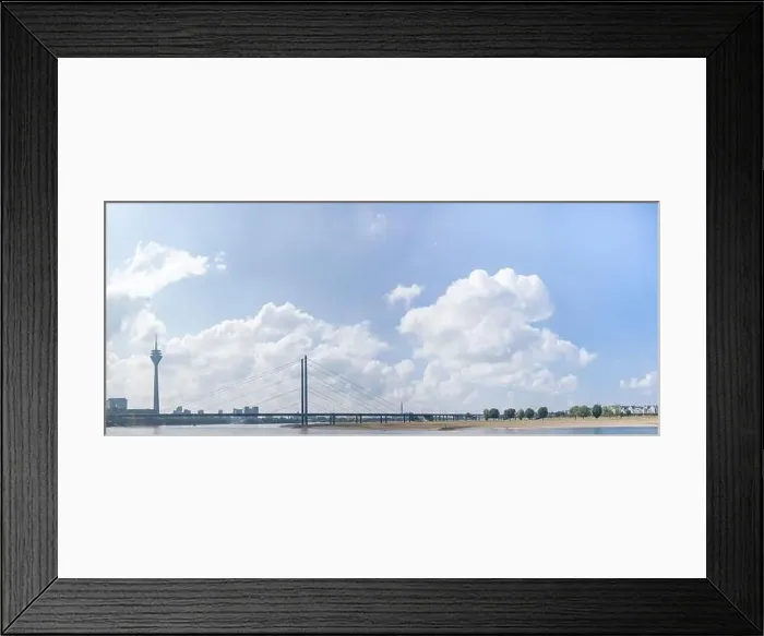 Framed Print : Panoramic photo of the teleradio tower and bridge from the embankment in Düsseldorf Framed Print : Panoramic photo of the teleradio tower and bridge from the embankment in Düsseldorf