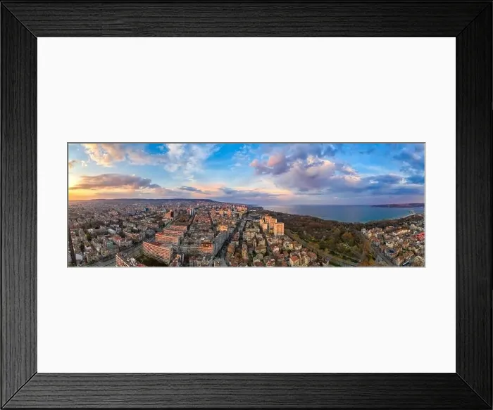 Framed Print : Stunning aerial panoramic view of the sky with colorful clouds over the city of Varna, Bulgaria Framed Print : Stunning aerial panoramic view of the sky with colorful clouds over the city of Varna, Bulgaria